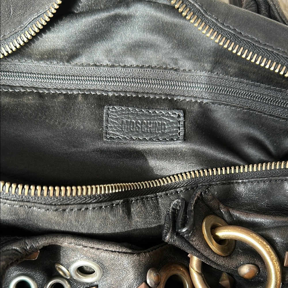 Moschino Black Backpack with Gold Accents